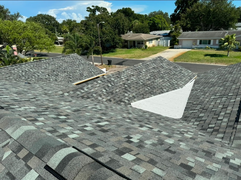 Proud American Roofing team on a completed job in Florida